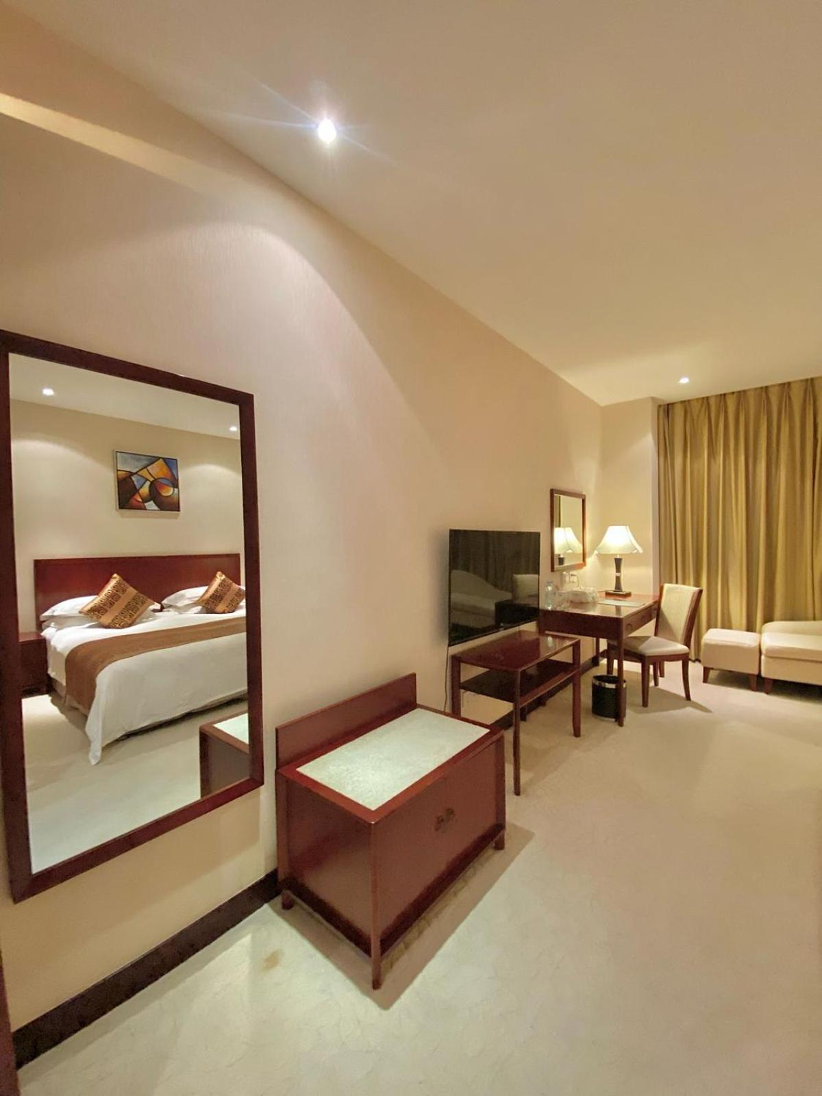 Beijing Palace Soluxe Hotel Astana Exteriör bild Deluxe Room