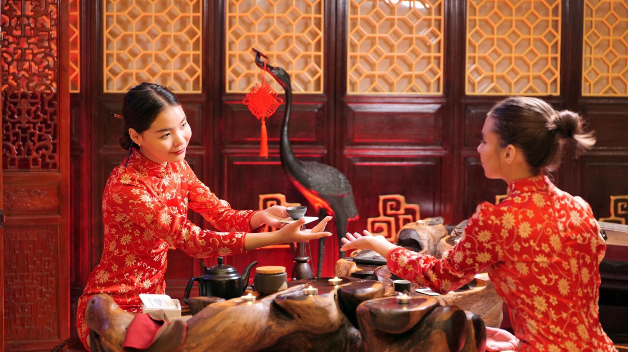Beijing Palace Soluxe Hotel Astana Exteriör bild Tea ceremony